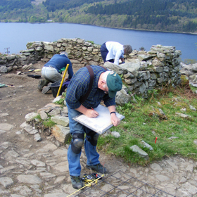 Volunteer planning the house at High Morlaggan